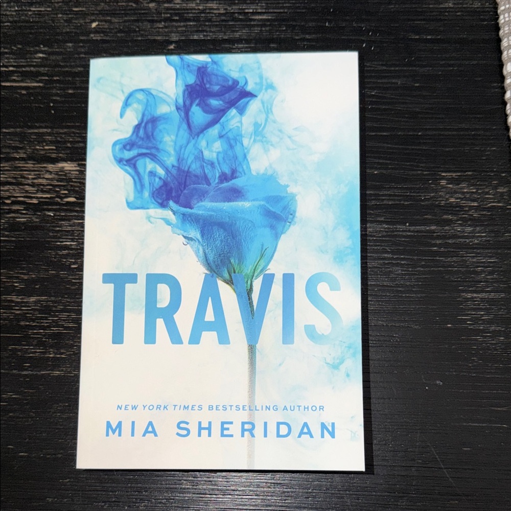 Travis by Mia Sheridan — Blue Cover Paperback